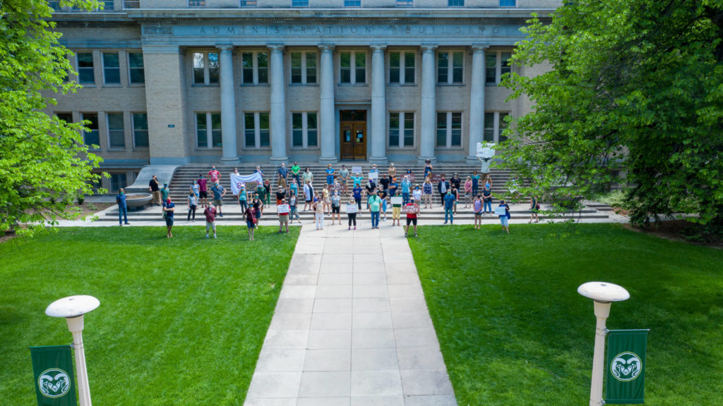 photo of open meeting in front of the Administration building
